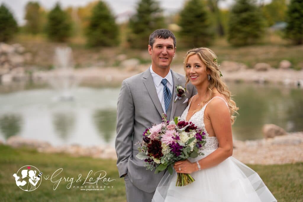 Newlyweds posing after their wedding at The Atrium in Sioux Falls.