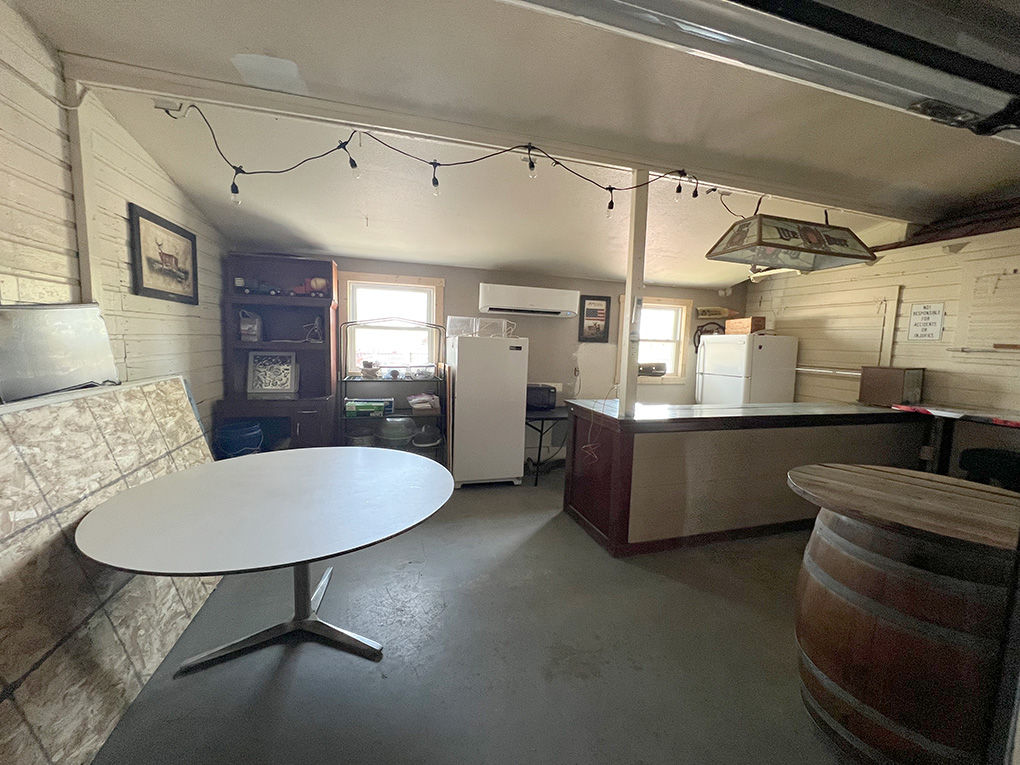 Rustic interior with bar counter and refrigerators