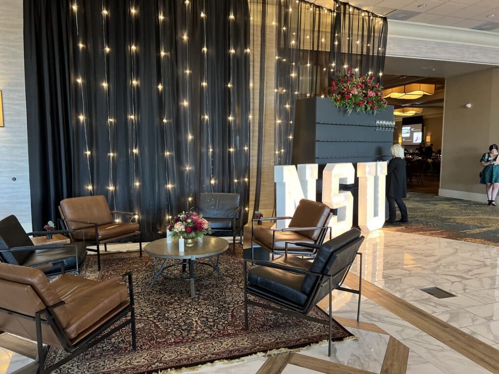 Event lounge with illuminated NSU letters and string lights