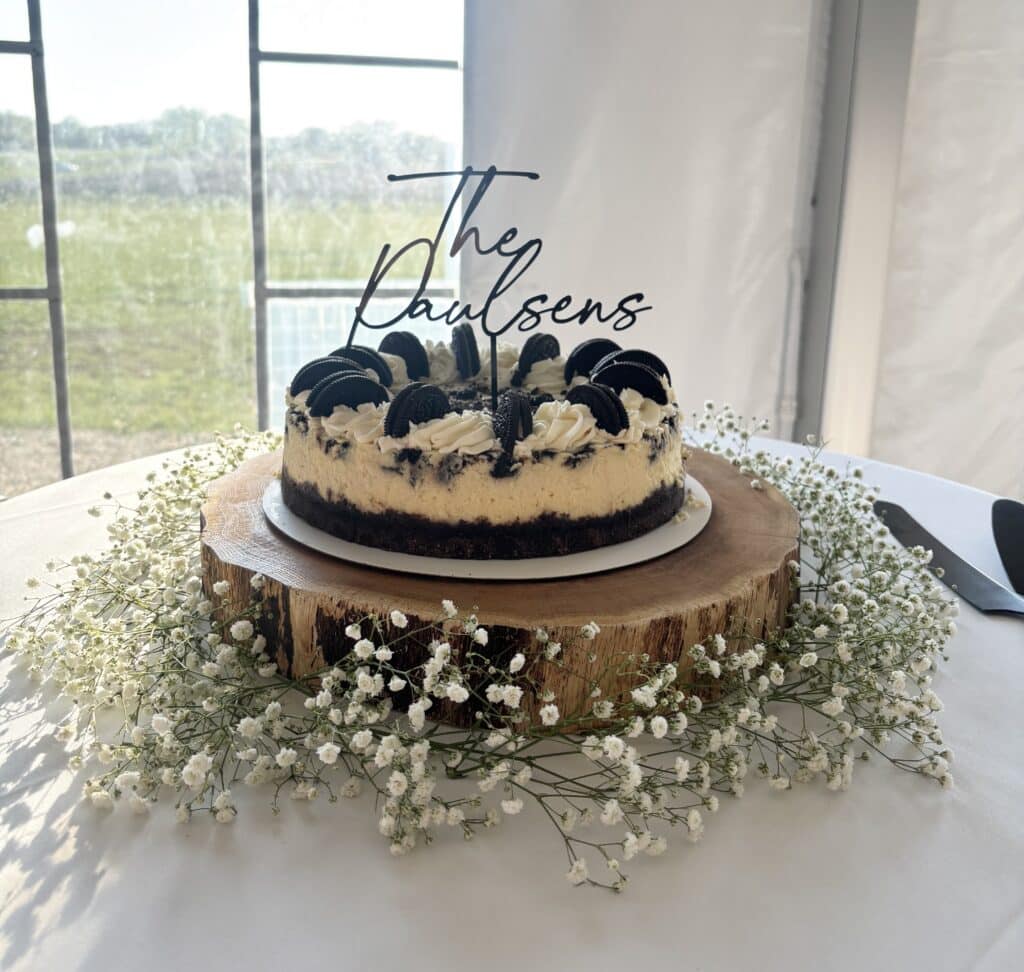 Oreo cheesecake with 'The Paulsens' cake topper