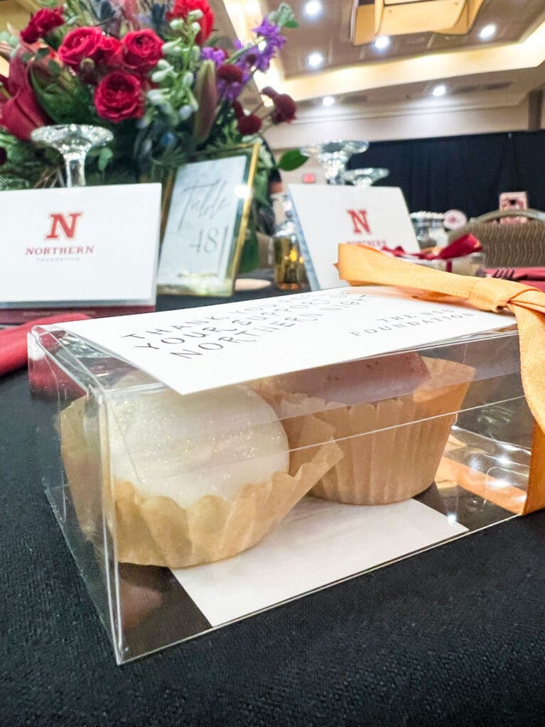 Boxed cupcakes at Northern Foundation event table