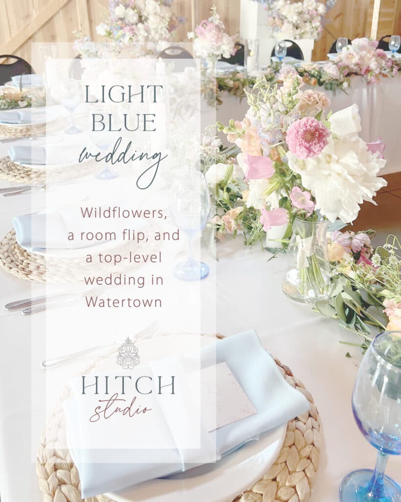 Pastel floral wedding table setting with elegant invitation text